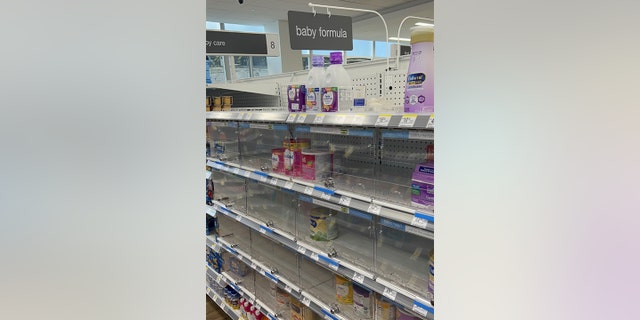 Shelves where baby formula is normally available are nearly bare.  