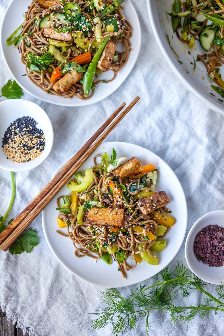 Here is a simple recipe for Soba Noodle Salad, loaded with veggies, that is adaptable and vegan!  For a protein boost, top with savory baked tofu, smoked salmon, grilled chicken.  Quick, easy and full of earthy crunchy goodness.