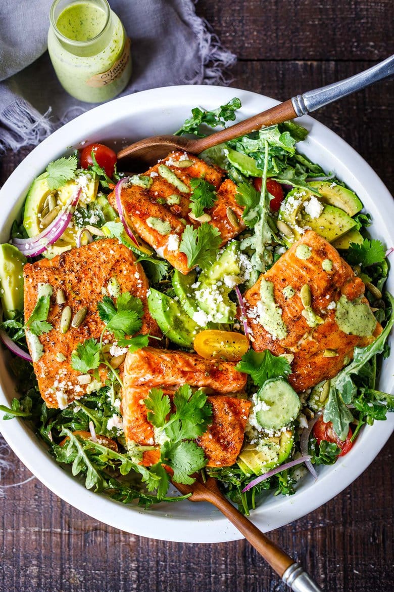 This Grilled Salmon Salad with Creamy Cilantro Lime Dressing is perfect for summer barbecues and outdoor gatherings. Chock full of fresh organic produce, not only is this entree salad healthy and easy to make, it's bursting with delicious summertime flavor! Keto and Low-carb.