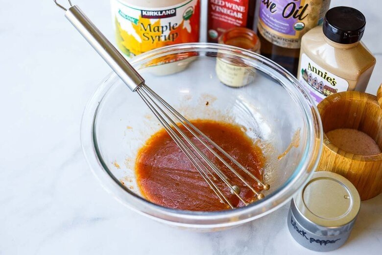 whisking dressing ingredients together
